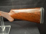 Browning Superposed.1953, 28 inch barrels with Briley thin walls on bottom, IM on top.CUSTOM ENGRAVEDby the late Edward Machu from Texas. - 16 of 20