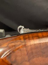 Browning Superposed.1953, 28 inch barrels with Briley thin walls on bottom, IM on top.CUSTOM ENGRAVEDby the late Edward Machu from Texas. - 7 of 20