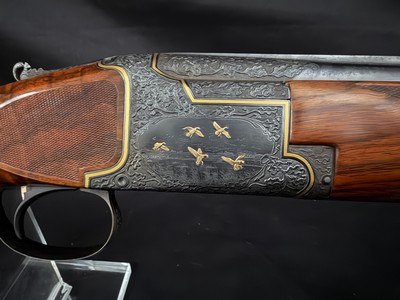 Browning Superposed.1953, 28 inch barrels with Briley thin walls on bottom, IM on top.CUSTOM ENGRAVEDby the late Edward Machu from Texas.