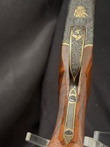 Browning Superposed.1953, 28 inch barrels with Briley thin walls on bottom, IM on top.CUSTOM ENGRAVEDby the late Edward Machu from Texas. - 10 of 20