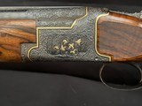 Browning Superposed.1953, 28 inch barrels with Briley thin walls on bottom, IM on top.CUSTOM ENGRAVEDby the late Edward Machu from Texas. - 18 of 20