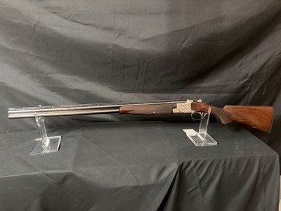 Browning Superposed Pigeon Grade 20 gauge, 28 inch 3 inch chambers barrel,14 3/8 lop with about 3/8 cast off Nice dark walnut with scnable forend