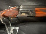 Caesar Guerini Invictus1 32 inch with Briley extended choke tubes.Very good conditon Factory red case. - Image 7 of 19
