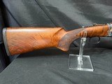 SKB 200 HR, 20 gauge,30 inch, high target rib, choke tubes, absolutely perfect condition.No box. - 2 of 17