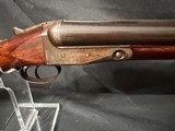 Parker Trojan, Double trigger, very nice 28 inch barrel with full and full chokes, Reciever shows nice petina.The wood shows the age of the gun - 10 of 13