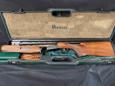 Perazzi Mirage S, Special Sporting, 32 inch, 14 3/8, .724 Bores with factory choke tubes. FLAT tapered rib.