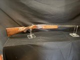 Charles Daly Miroku 410 gauge, 26.5, mod and full.Nice and tight.Perfect metal Real nice wood14.25 lop