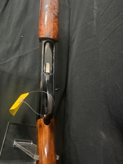 Remington 1100left hand, fixed skeet choke adjustable comb, factory green plastic case - Image 14 of 15