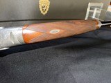 Famars Excaliber Lusso engraning, 20 gauge, 31.5 inch barrel,mod and full.great condition, wood butt plate, factory case - Image 13 of 15