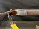 Famars Excaliber Lusso engraning, 20 gauge, 31.5 inch barrel,mod and full.great condition, wood butt plate, factory case - Image 2 of 15