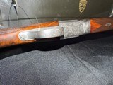 Famars Excaliber Lusso engraning, 20 gauge, 31.5 inch barrel,mod and full.great condition, wood butt plate, factory case - Image 11 of 15