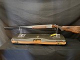 Famars Excaliber Lusso engraning, 20 gauge, 31.5 inch barrel,mod and full.great condition, wood butt plate, factory case - Image 6 of 15