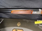 Famars Excaliber Lusso engraning, 20 gauge, 31.5 inch barrel,mod and full.great condition, wood butt plate, factory case - Image 8 of 15