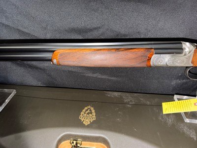 Famars Excaliber Lusso engraning, 20 gauge, 31.5 inch barrel,mod and full.great condition, wood butt plate, factory case - Image 8 of 15