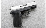SIG Sauer ~ SP2022 ~ 9mm - 1 of 3