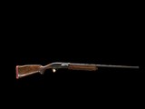 EMPLOYEE OWNED REMINGTON 1100 CLASSIC TRAP HAND PICKED WOOD