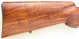 Al Biesen Winchester pre-64 Model 70 .338 Winchester Magnum, integral brake, outstanding walnut, trapdoor, 99 percent - 9 of 12