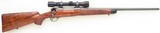 Al Biesen Winchester pre-64 Model 70 .338 Winchester Magnum, integral brake, outstanding walnut, trapdoor, 99 percent - 1 of 12