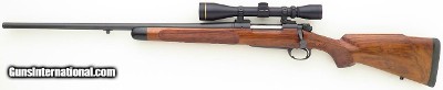 Left hand Biesen custom .338 Winchester Magnum made for family member, integral brake, highly refined, tremendous wood, provenance, 98%, layaway