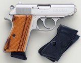 Walther PPK/S .380 ACP, Interarms, stainless steel, both wood and plastic grip sets, likely unfired, 99 percent