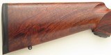Kimber 84M Varmint .22-250, 26-inch stainless fluted, AA-grade claro, pillar bedded, scalloped bases, 95 percent - 9 of 10