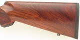 Kimber 84M Varmint .22-250, 26-inch stainless fluted, AA-grade claro, pillar bedded, scalloped bases, 95 percent - 10 of 10