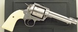 Ruger Super Blackhawk Bisley .44 Magnum, stainless, 5.5-inch, Mag-Na-Port, case, 97 percent - 1 of 9