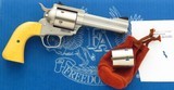 Freedom Arms 1997 / 97 .22 LR & .22 Magnum, 4.25-inch octagon, round butt, polished & jeweled, box, likely unfired, layaway