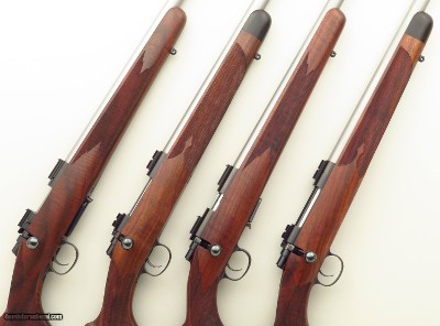 Special order set of four Cooper rifles with serial 99, .17 CCM, .17 Mach IV, .22 LR, .223 Rem., 24-inch stainless, boxes, targets, unfired, layaway