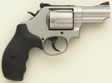 Smith & Wesson Model 69 .44 Magnum, 5-shot, 2.75-inch, stainless steel, round butt, case, 90 percent - 1 of 8