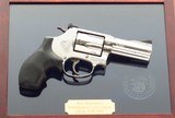 Special presentation Smith & Wesson Performance Center Model 60 .357 Magnum, 3-inch, engraved, cased, 98%, collection of Roy Huntington, layaway