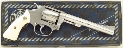 Early and unique Smith & Wesson Model 63 .22 LR with 6-inch barrel, ivory grips, box, collection of gunwriter Dick Metcalf, layaway