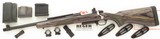 Left hand Ruger Gunsite Scout .308 Win., threaded, sights, ring mounts, four factory magazines, box, 98 percent