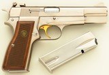 Belgian Browning Hi-Power 9mm, 1980, nickel, adjustable, two magazines, appears unfired, layaway - 1 of 8