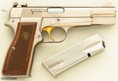 Belgian Browning Hi-Power 9mm, 1980, nickel, adjustable, two magazines, appears unfired, layaway