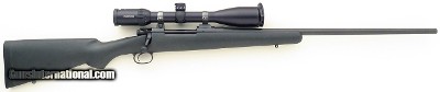 Dakota 97 Hunter .300 Dakota, checkered knob, Swarovski Z6 3-18x50, 25.5-inch, pristine bore, 98 percent, layaway