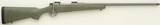 Legendary Arms Works Model 704 7mm Remington Magnum, fluted, brake, Timney, pillar bedding, seven pounds, 99 percent, layaway - 1 of 10