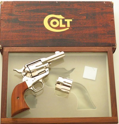 Colt Single Action Army Sheriffs Model .44 Special with serialed .44-40 cylinder, 1980, nickel, three-inch, box, display case, unfired, layaway