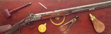 Lang percussion rifle, serial 189, game scene engraving, cased, Damascus, .524-inch land diameter, folding leafs, circa 1845, great bore, layaway