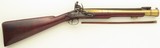 Charles Grierson (London) cannon-barreled flintlock blunderbuss, brass, spring-loaded bayonet, strong condition, layaway