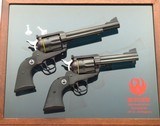 Ruger Blackhawk 50th Anniversary serialed pair .357 Magnum & .44 Magnum, flat top, display case, hard cases, unfired, layaway - Image 1 of 13