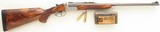 Rigby double rifle in .35 Rigby, express, quarter rib, ejectors, scalloped boxlock, AAA English, BL Hands engraving, 450 rounds, over 90%, layaway - Image 1 of 15