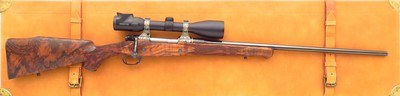 Bolliger / Mountain Riflery Best Grade .338 Rem. Ultra Mag, Winchester 70 CRF, Dubber engraving, AAA English, Swarovski, cased, ammo, 98%, layaway - Image 1 of 15