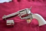 COLT SAA 45LC CAL WITH EXTRA 45ACP CYLINDER and IVORY GRIPS - 1 of 13