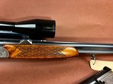 Superb engraved Antonio Zoli over/under combination gun with additional shotgun barrels and high end scope - 12 of 12