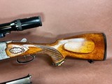 Superb engraved Antonio Zoli over/under combination gun with additional shotgun barrels and high end scope - 11 of 12