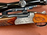 Superb engraved Antonio Zoli over/under combination gun with additional shotgun barrels and high end scope - 3 of 12