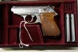 WALTHER PPK 22
PREWAR ENGRAVED WITH 2 FACTORY MAGAZINES
AND SPECIAL PRESENTATION CASE. - 8 of 9