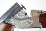 RUSSIAN - TOZ 34 EP - 12 GAUGE WITH EJECTORS - GAME SCENE HAND ENGRAVING
- 7 of 12
