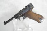 LUGER PISTOL - CODE 42 / MADE IN 1939 - ALL MATCHING SERIAL NUMBERS - SOLD - 1 of 11